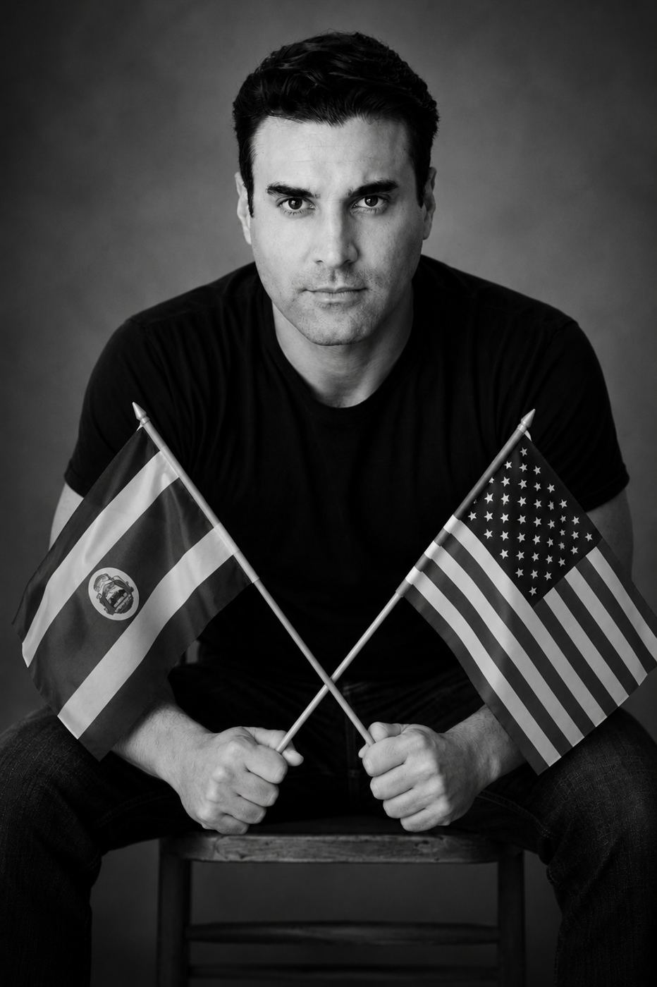 A.J. Castro holding the Costa Rican and American flags